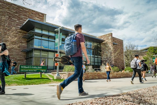Students enjoy a warm spring day on the Colorado State University campus, April 26, 2019.